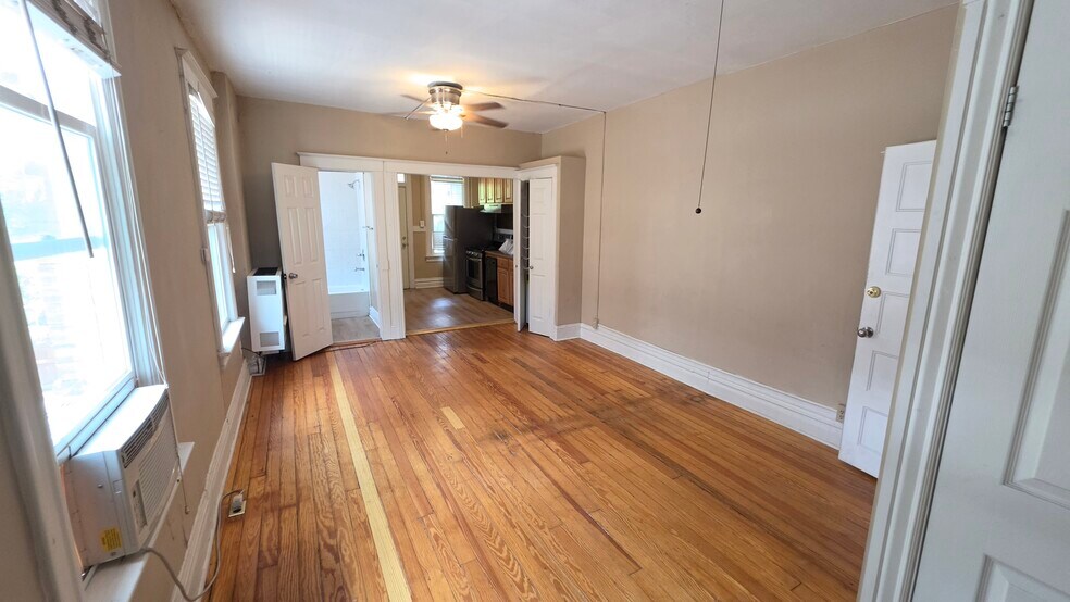 View into Living room from bedroom - 210 S Logan St