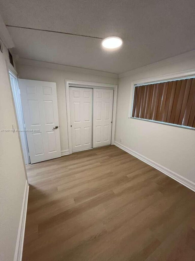 Building Photo - 8740 N Sherman Cir