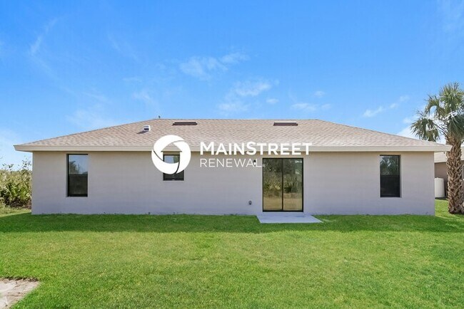 Building Photo - 4 Bedroom Pet-Friendly Home in Lehigh Acres, FL with Main Street Renewal