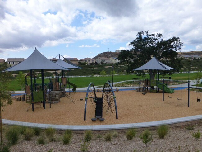 Building Photo - Short Term Lease - Grand 4-Bedroom Home with Entertainer's Yard in Gated River Village!