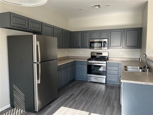 Building Photo - 8037 Peaceful Village Pl