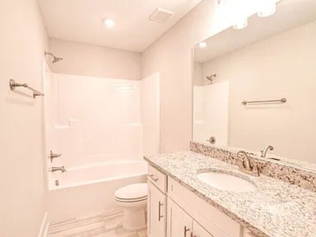 Building Photo - Situated on over 3 acres right in a growin...
