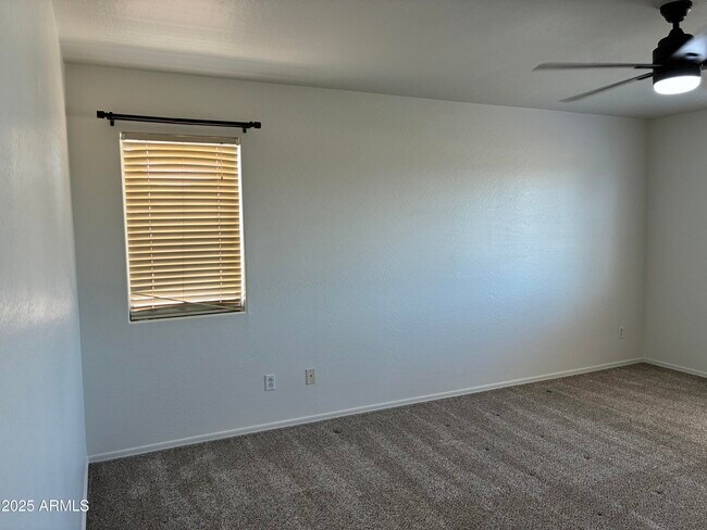 Building Photo - 7287 S Sunrise Way