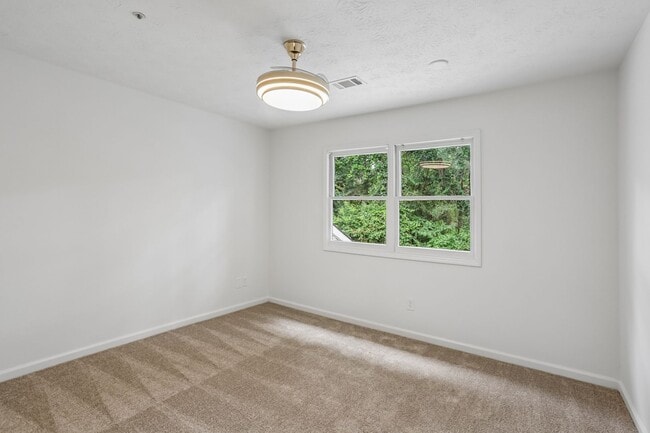 Building Photo - Bright and Gorgeous - Updated 3BR/2BA Townhome!