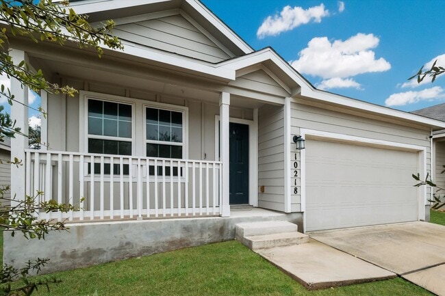 Building Photo - Open-Concept Living with New Flooring