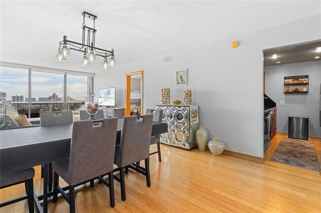 Building Photo - 3675 N Country Club Dr