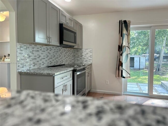 Building Photo - 6452 Royal Palm Beach Blvd