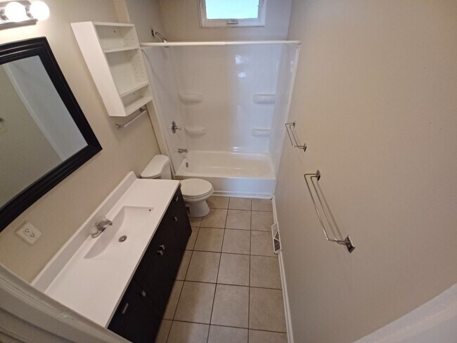 Building Photo - This spacious 3-bedroom lower level duplex...