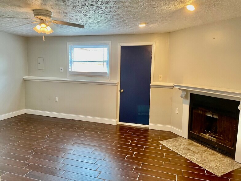 downstairs living area - 5042 Magnolia Blossom Blvd