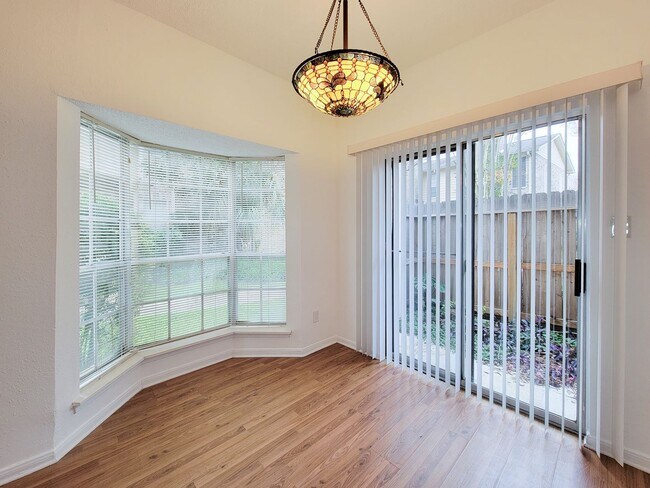 Building Photo - Beautiful two-story corner unit filled with natural light!