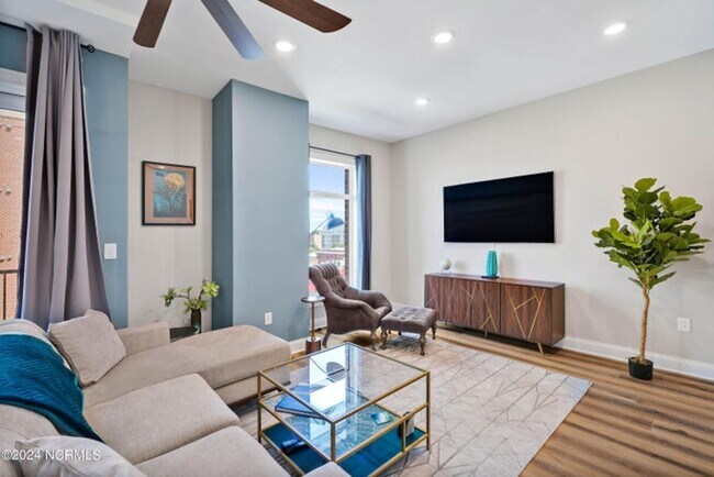 Building Photo - Welcome to your dream condo in the heart o...