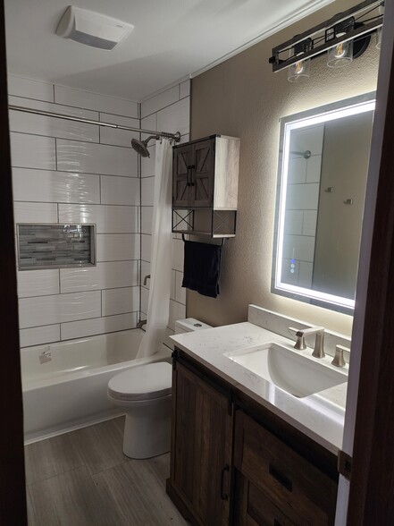 Kohler shower, chair hight toilet dual flush, soft close drawers, lighted mirror - 135 Ridge Ct