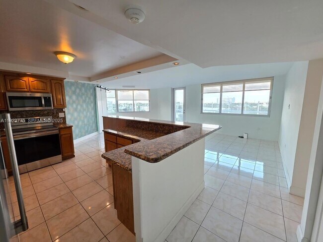 Building Photo - 7135 Collins Ave