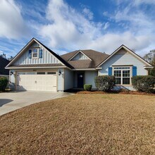 Building Photo - Modern Elegance in Nelson Hill: 4BR/2BA Oasis with Wood Floors, Fenced Yard, and Pet-Friendly Perks!