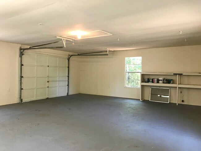 Building Photo - Unique Find! HUGE detached garage/workshop, 3 bedroom, 1 1/2 bath home, screened porch