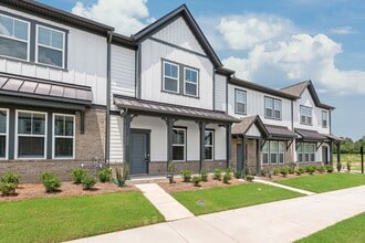 Building Photo - Welcome home to this stunning brand-new townhome in one of Indian Trail's newest and most desirab...