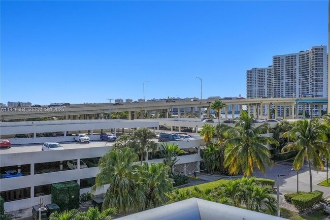 Building Photo - 19380 Collins Ave