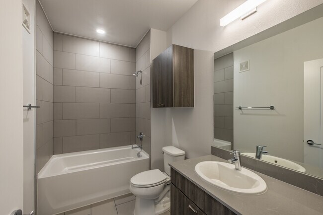 Building Photo - South Austin 2BR Condo with Balcony & Luxury Amenities