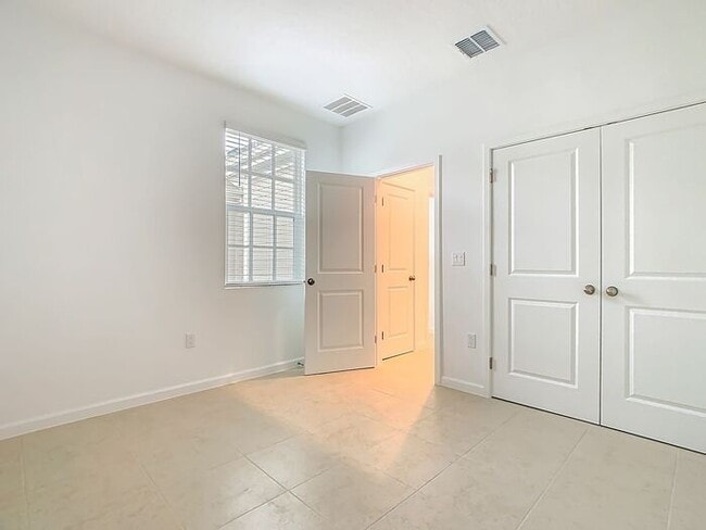 Building Photo - New Luxury Townhome in Celebration, FL Corner unit. All porcelain tiled floors. Aleutian model by...