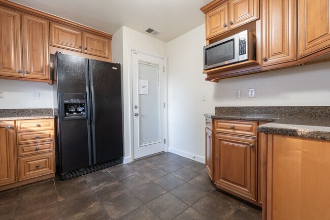 Building Photo - MOVE IN READY 4-bedroom Ranch home nestled in the Heart of Norfolk!