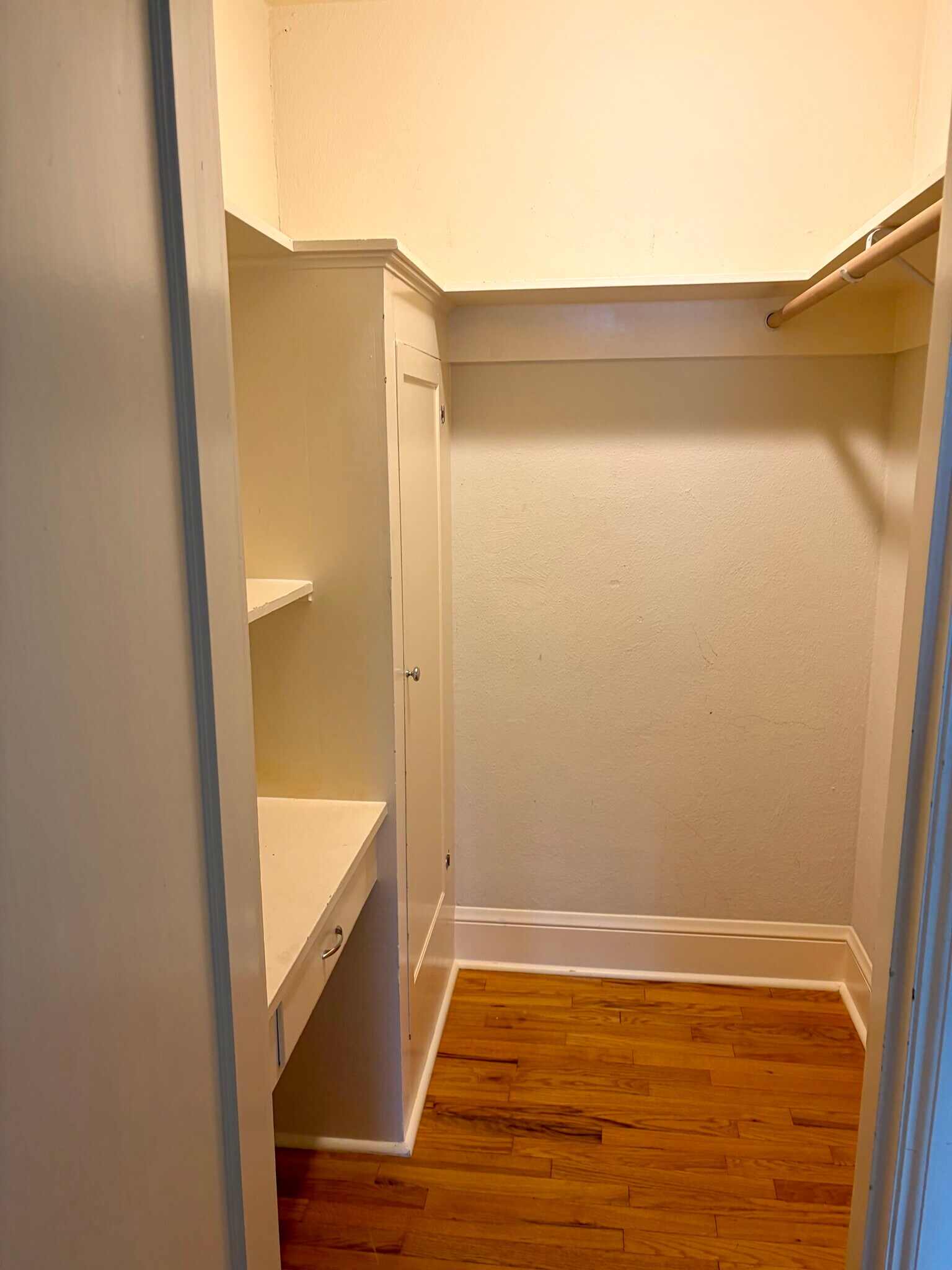 Closet 4/5 located across from bathroom - walk in with ample storage and built ins - 1509 NE 10th Ave