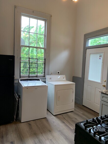 Kitchen: View toward backdoor - 921 N Miro St