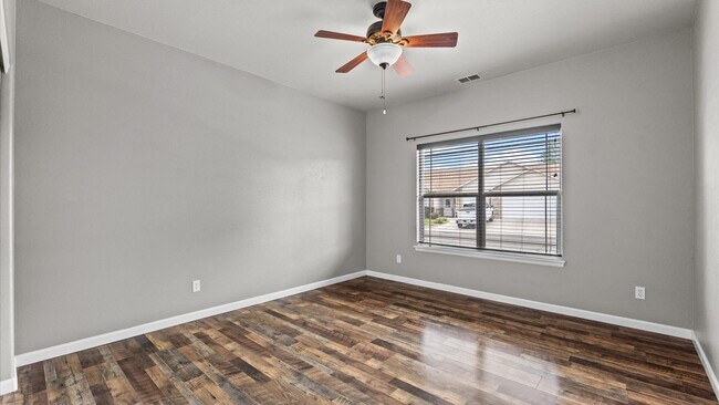 Building Photo - Spacious 3-Bed Ranch Home w/ 3-Car Garage & RV Parking In Quiet North Grand Junction Neighborhood