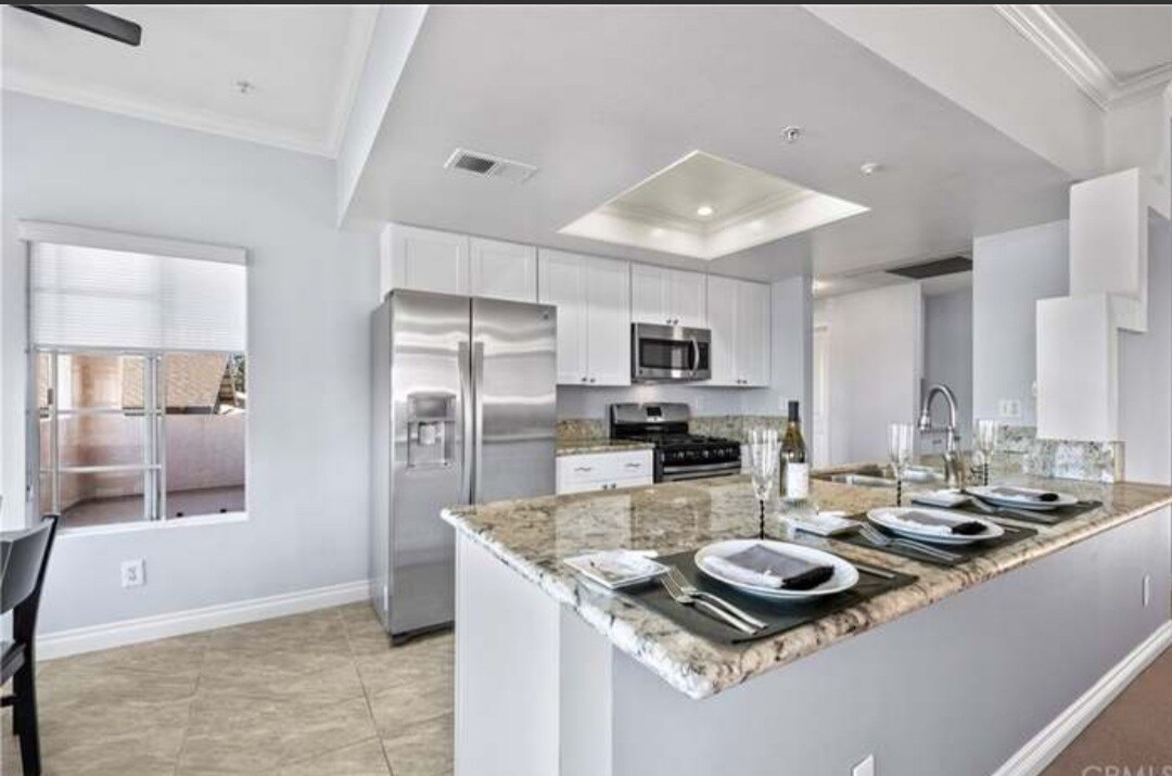 Building Photo - 4581 Warner Ave