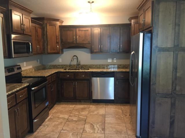 Beautiful kitchen with custom cabinets and granite countertops. All appliances included - 1614 College Street