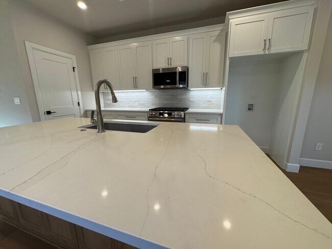 Building Photo - BRAND NEW - 4 bed - 3 bath - 2 car with fenced yard!