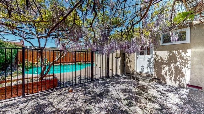 Building Photo - PURE Property Management - Stunning four-b...
