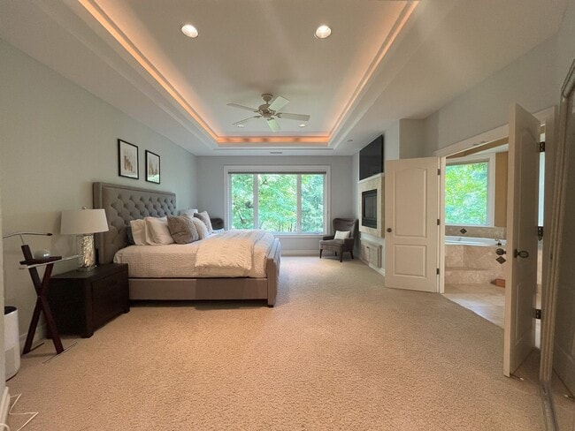 Building Photo - Forest-View Luxury Home with 5 Bedrooms, Luxury Primary Suite & Gourmet Kitchen