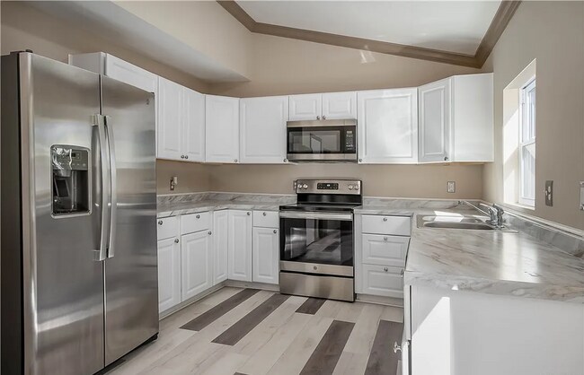 Building Photo - This Charming Two-Story Home Awaits You