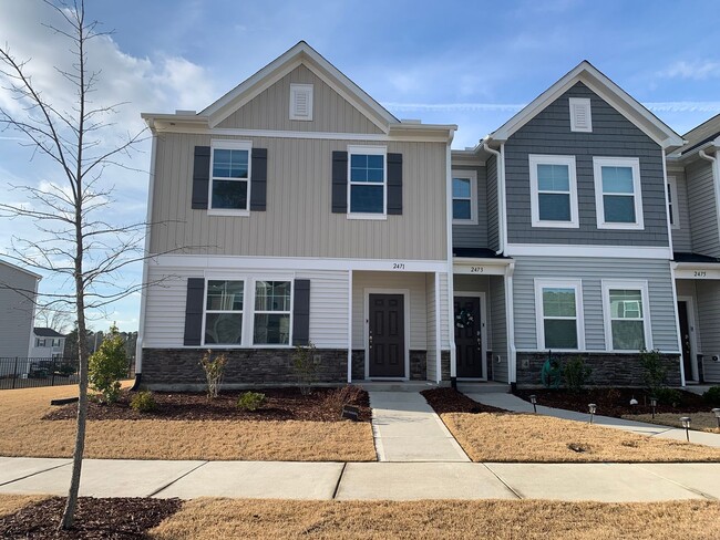 Building Photo - Gorgeous New Construction Townhome! Great ...