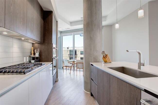 Building Photo - Stunning 2-Bedroom Condo at Sloan's Lake's Premier Lakehouse Community