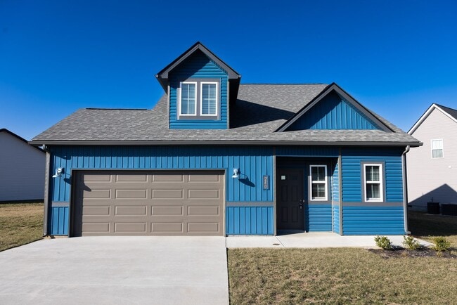 Building Photo - Elegant Home with Stone Fireplace, Kitchen Island and Designer Primary Suite