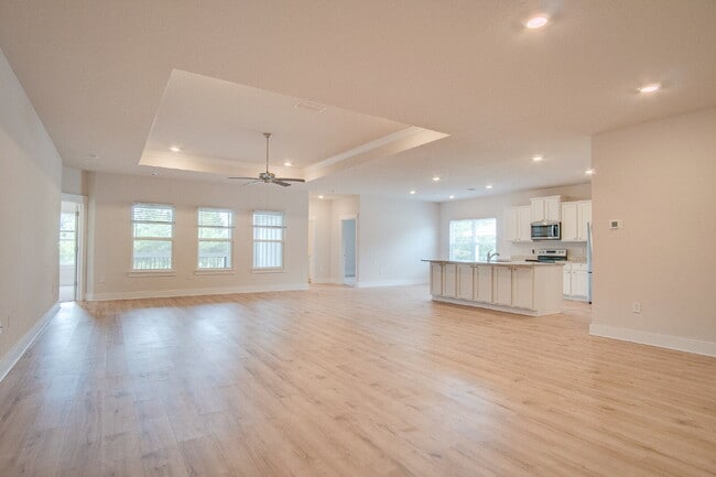 Building Photo - Holiday Sunshine! Deer Run 4BR/3BA Home – Solar, Community Pool & ½ Deposit for Active Military