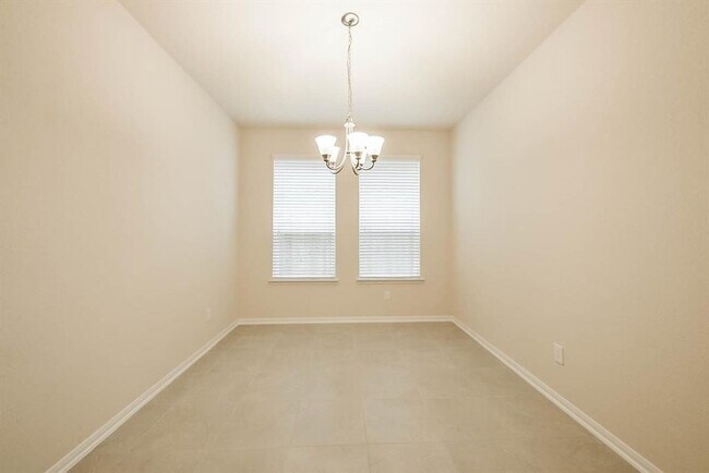 Building Photo - Beautiful stone front 4 bedroom, 3 bath home has bay windows in breakfast nook & master. It is on...