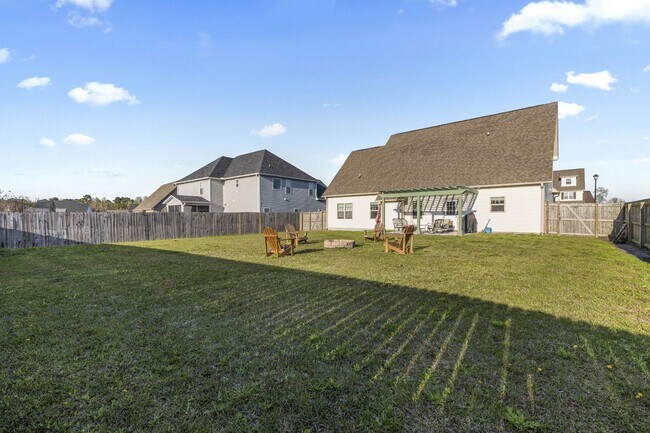 Building Photo - 3 Bedroom + Bonus Room Home with Main Floor Primary Suite & Community Pool Access