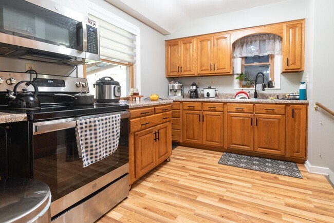 Building Photo - Beautiful 3-Bedroom, 3-Bathroom Home with Finished Basement, Garage, and Fenced Backyard – $1,995...