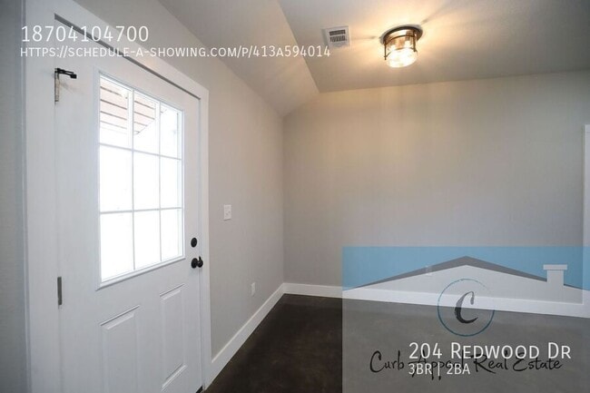 Building Photo - 204 Redwood Dr