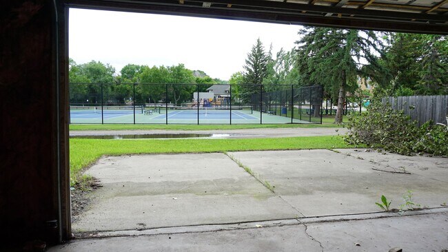 Building Photo - Charming Fully Remodeled Home with 4 Garage Stalls & Park Access in Central Minot