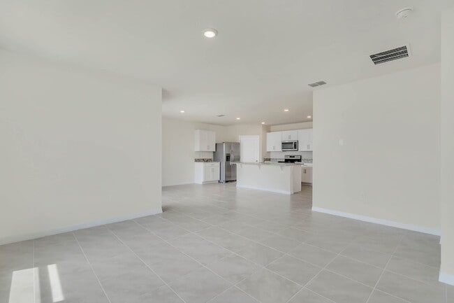 Building Photo - 4 bedrooms and 2 bathrooms, the spacious 1,828 sq ft home features an open concept with a 2 car g...