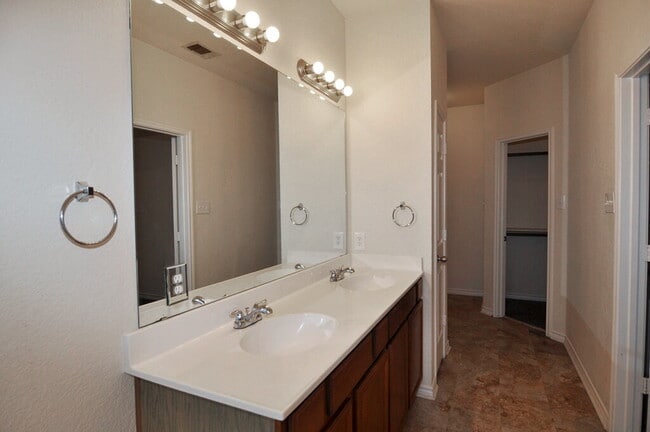 Building Photo - "Warm And Welcoming 3-2-2 With Open Living In a Prime Location!"