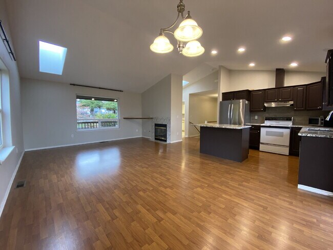 Building Photo - Spacious 4-bedroom with Panoramic Deck Nex...