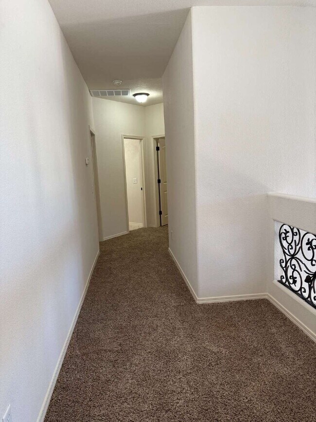 Building Photo - "Spacious 4-Bedroom Oasis with Granite Kit...