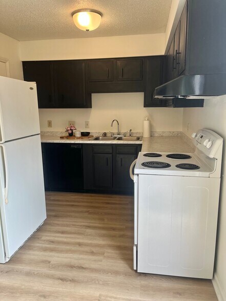 Kitchen with new dish washer - 4520 Central Ave