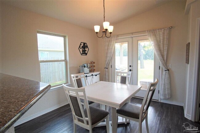 Building Photo - Popular Floor Plan, Almost New Home in Woo...