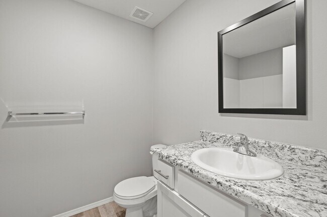 Building Photo - 4 bedroom home with a fenced in yard!