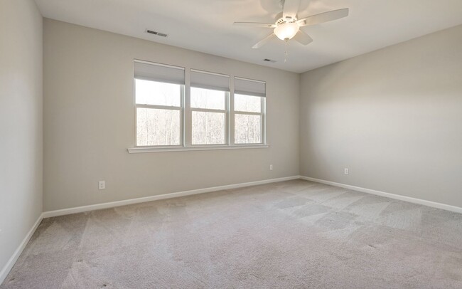 Building Photo - Contemporary, spacious 3-bedroom, 2.5-bath...